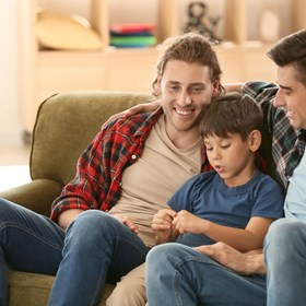 Parents and son Fathers smiling with son