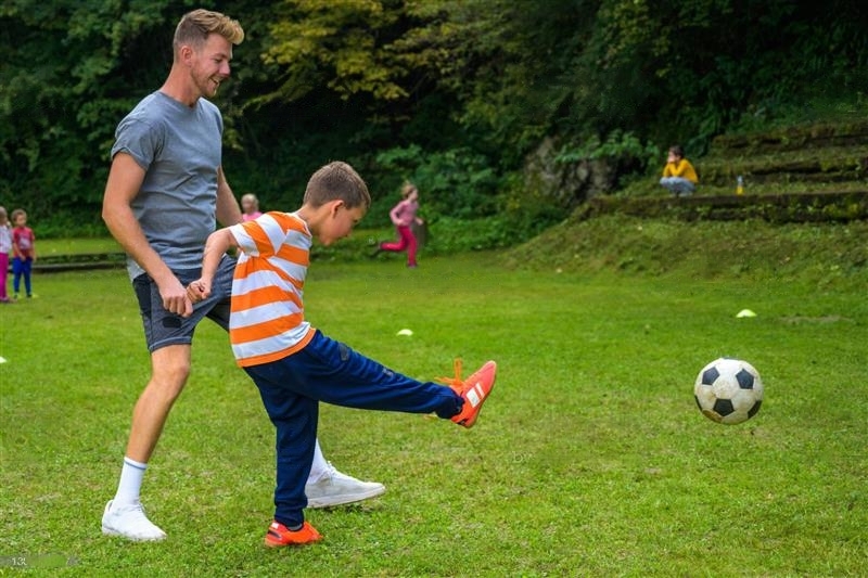 student volunteer with young person